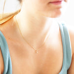 Tiny Pearl S Initial Charm Necklace in Gold