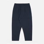 UNIVERSAL WORKS Pleated Track Pant in Navy
