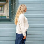 COLLEN & CLARE Zuri Cotton Roll Neck Jumper in Natural Marl