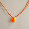 GUILA PARIS Cord Shell Necklace in Orange