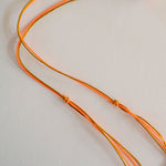 GUILA PARIS Cord Shell Necklace in Orange