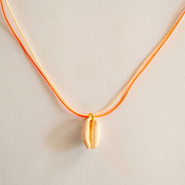 GUILA PARIS Cord Shell Necklace in Nude