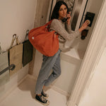 LES PENSIONNAIRES Organic Cotton Bowling Bag in Flamboyant Orange