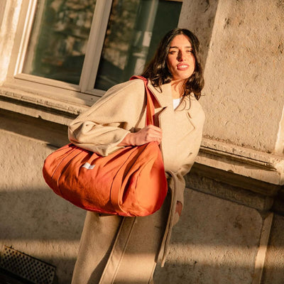 LES PENSIONNAIRES Organic Cotton Bowling Bag in Flamboyant Orange