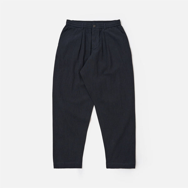 UNIVERSAL WORKS Pleated Track Pant in Dark Navy