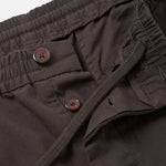 UNIVERSAL WORKS Oxford Mirco Canvas Trousers in Brown