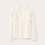 White blouse on a light gray background