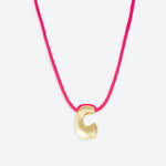 LA MOME BIJOU C Initial Joy Letter Necklace in Gold