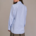 DIEGA Caramba Pinstripe Ruffle Shirt in Light Blue