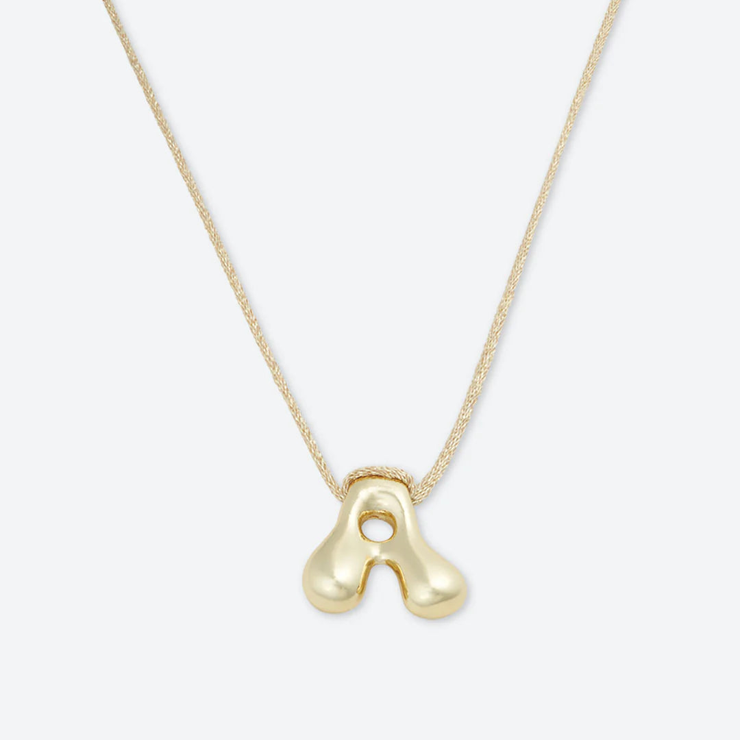 LA MOME BIJOU Joy Letter Necklace in Gold/Gold