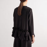 MEI MEIJ Scuba Peplum Long Sleeve Top in Black