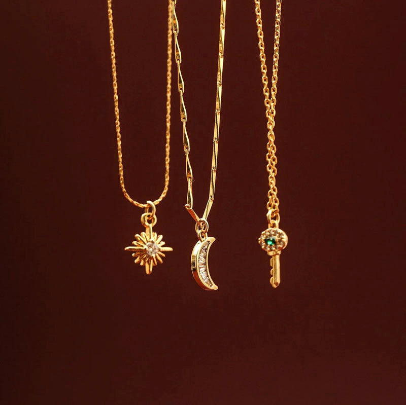 ORELIA Crystal Baguette Moon Charm Necklace in Crystal