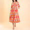 HANDPRINT DREAM APPAREL Tuscany Dress in Ikat Coral