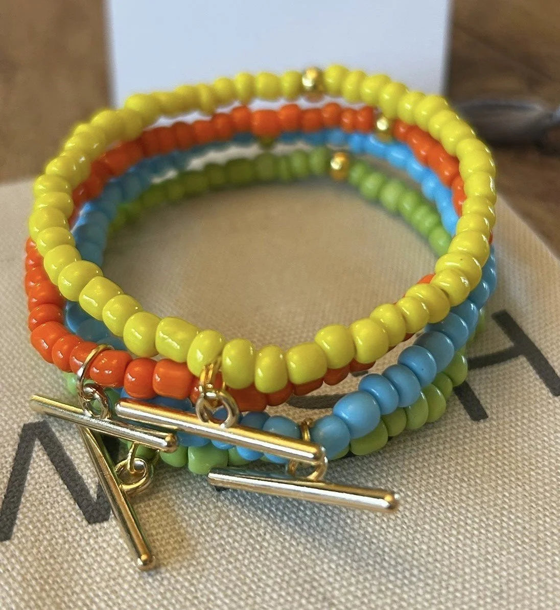 WISH T Bar Bracelet in Orange