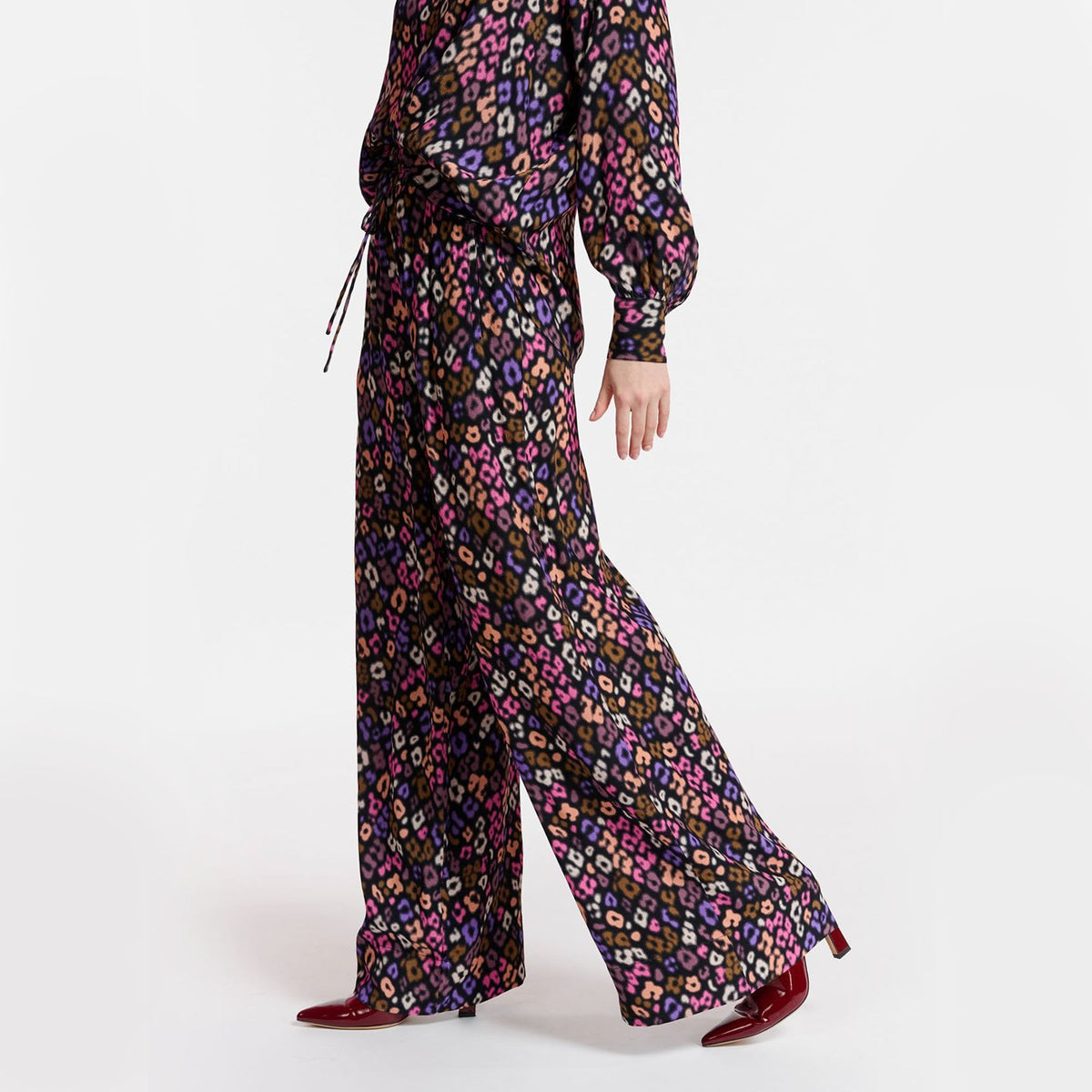 ESSENTIEL ANTWERP Extrovert Leopard Print Trousers in Black/Pink/Brown