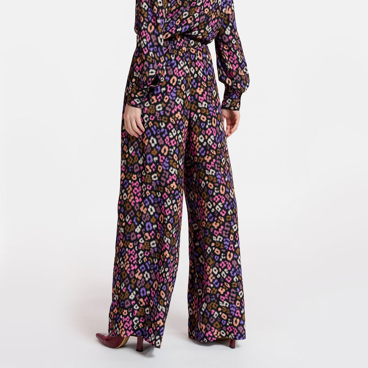 ESSENTIEL ANTWERP Extrovert Leopard Print Trousers in Black/Pink/Brown